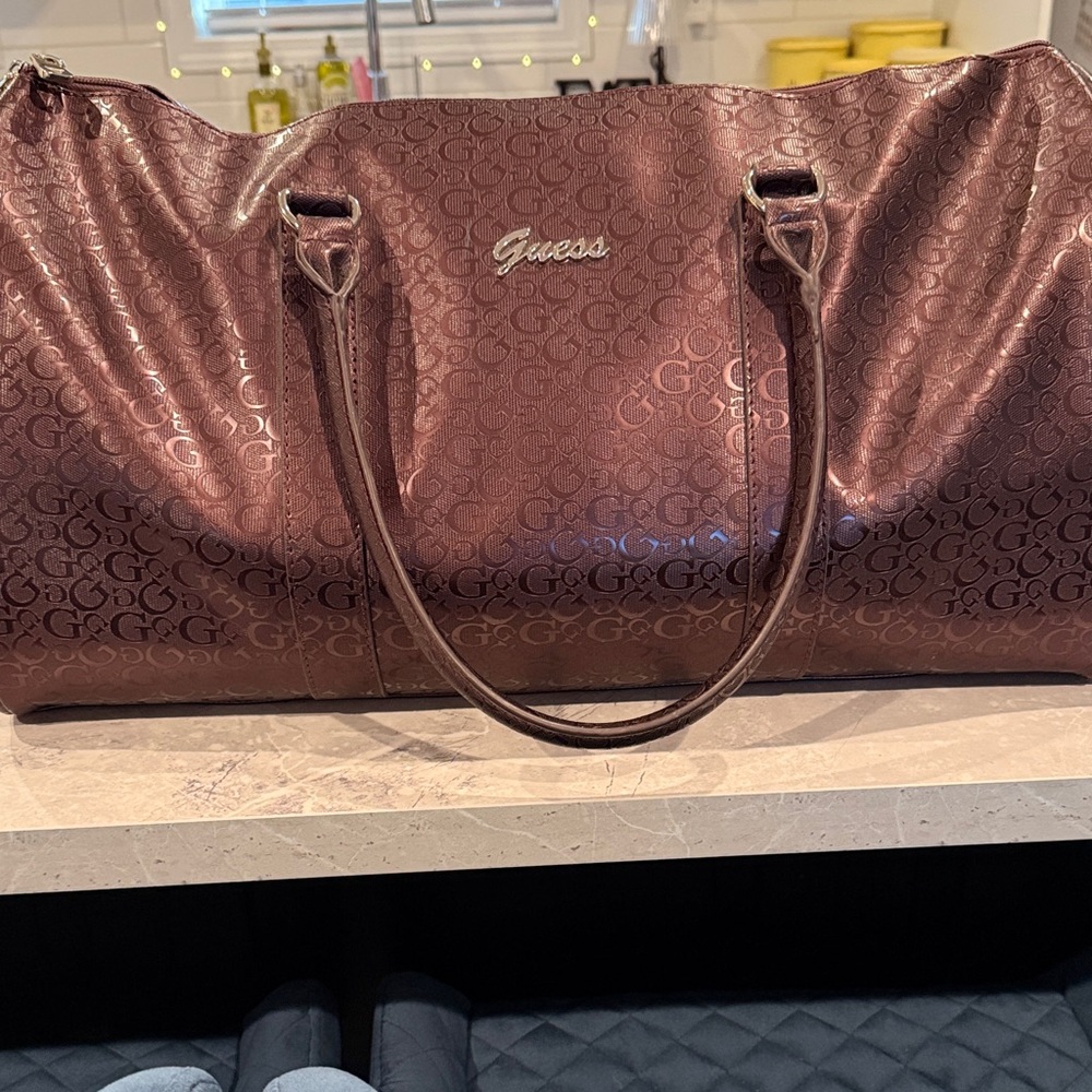 Guess maroon / Purple Monogram Travel Bag